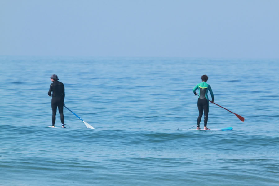 Stand up paddle-surfing och yoga