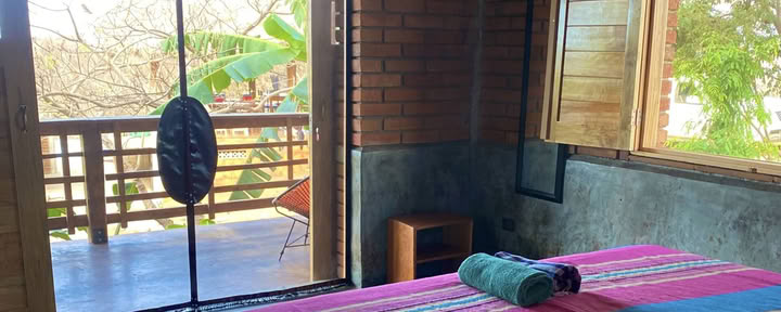 Private ground floor room with a queen or king size bed, shared bathroom & shared veranda